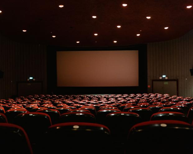 The Bolton News: During school holidays you can take advantage of cheaper movie screenings. Picture: Canva