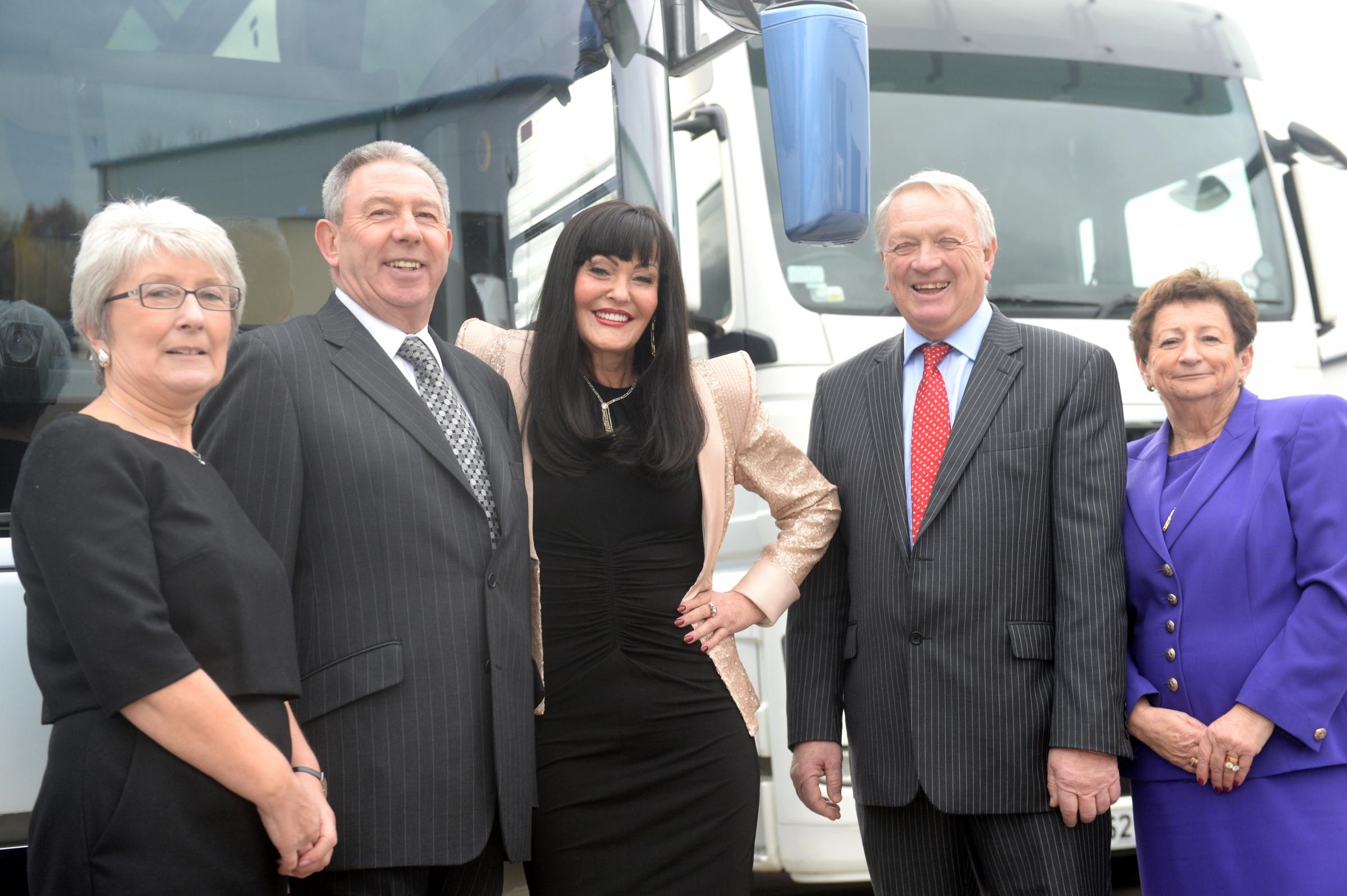 Hilary Devey at Commercial motors. (left to right) Mary Manchip, Robert Manchip, Hilary Devey, Roger Sheddick and Gill Sheddick.