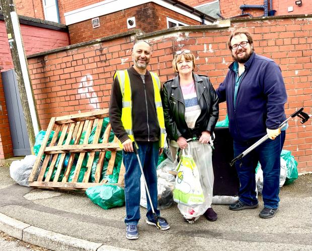 The Bolton News: Cllrs Shafi Patel and Toby Hewitt regularly help out with Carole Jegede and Morris Green Litter Pickers