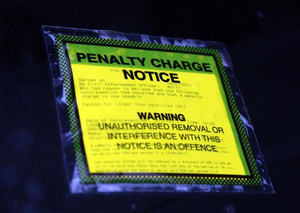 The Bolton News: Private parking companies have been accused of being overly aggressive in their pursuit of fees (PA)
