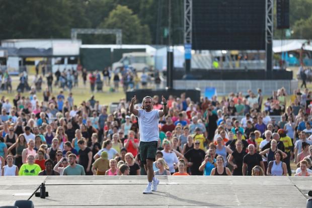 The Bolton News: Last week Joe Wicks lead a record breaking attempt for the largest HIIT Workout at BST Hyde Park, London. Picture: PA