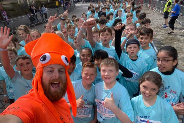 The Bolton News: Christopher Hill and Ironkids taking part in todays race