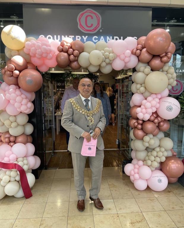 The Bolton News: Bolton Mayor Akhtar Zaman at the grand opening of the new shop