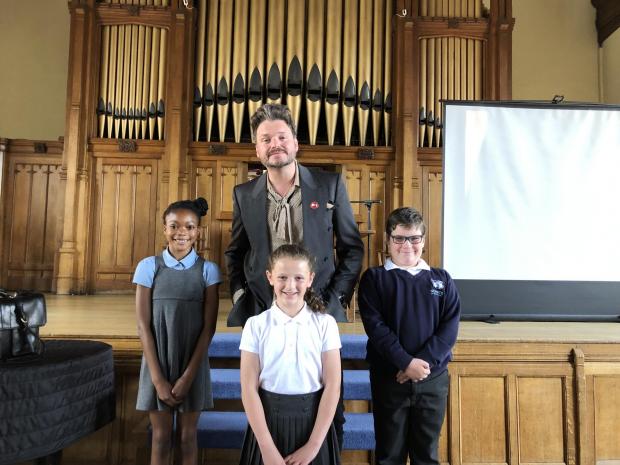 The Bolton News: Local poet Oliver Lomax also gave a talk and recited poems to the children