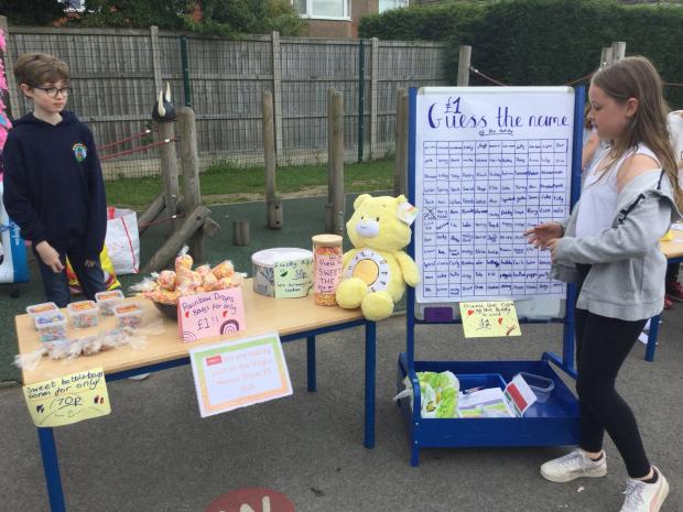 The Bolton News: Children at the school designed stalls, which made a combined £185 in profit