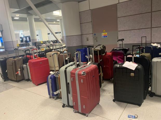 The Bolton News: Hundreds of left suitcases in Manchester Airport