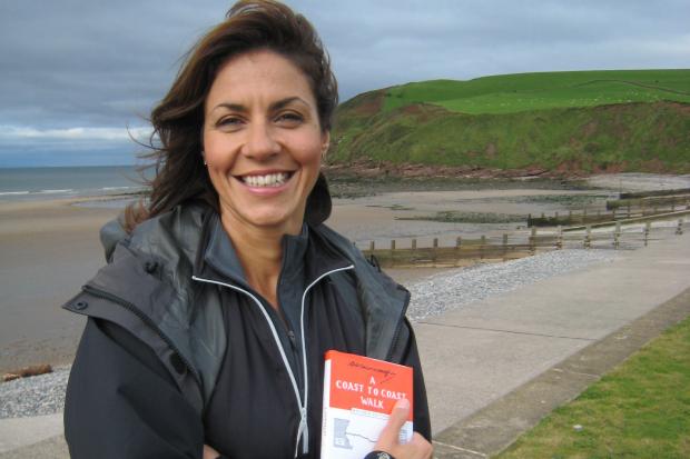 TV presenter and keen walker Julia Bradbury at the start of the Coast to Coast walk in St Bees, Cumbria