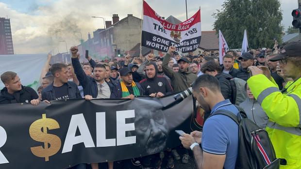 The Bolton News: The incident occurred outside the Tollgate pub, where United supporters had congregated for a protest march against the Glazer family. Picture: PA