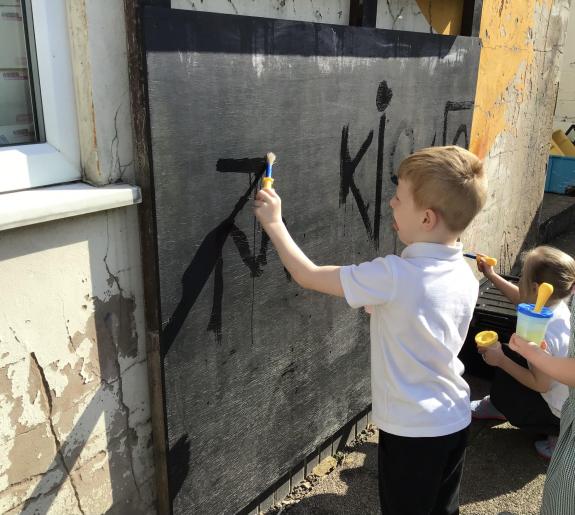 The Bolton News: Mason painting with water at the Nurture Group The Bolton News: Mason painting with water at the Nurture Group