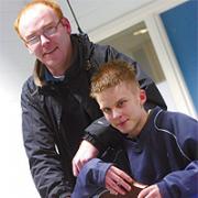success: John Durkin holds his award with youth worker Paul Cartwright