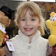 WELL MET: Bolton Mayor Bear and Pudsey join Hannah Downing, aged six, at the fundraising coffee morning in Horwich