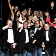 Winners: Staff from Parcels2go which was named Business of the Year in 2009