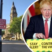 Boris Johnson pictured alongside Bolton Town Hall