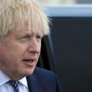 HARTLEPOOL, ENGLAND - MAY 03: Britain's Prime Minister, Boris Johnson reacts as he greets members of the public while campaigning on behalf of Conservative Party candidate Jill Mortimer (unseen) ahead of the 2021 Hartlepool by-election to be held on