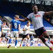 Dapo Afolayan celebrates a goal at Ipswich in Wanderers' 5-2 win