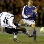 Cleveland Taylor in action for Wanderers against Stockport in 2002
