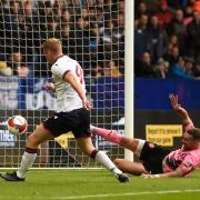Eoin Doyle scores the equalising goal for Wanderers against Stockport