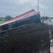 Lorry turned on its side due to a 'collision' on the M6