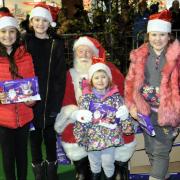 FLASHBACK: Santa meets visitors to the Farnworth Christmas Lights Switch On in 2018