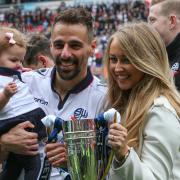 Fil Morais and his family celebrate promotion from League One in 2016/17 at Wanderers