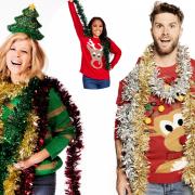 Kate Garraway, Alex Scott and Joel Dommett are taking part in Christmas Jumper Day (PA)