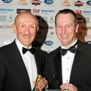 WELL DONE: Paul Davidson, left, receives his Special Achievement Award from Ian Settle, of NatWest bank