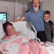 RECOVERY: Laura with partner John Leece and step-son Lexi