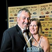 HAPPY COUPLE: Gary and Ann Hawthorne, celebrating Maytree Travel’s success in  the SME Business of the Year category, which was sponsored by Wilds accountants