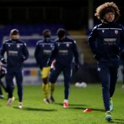 Marlon Fossey, right, warms up with the Wanderers players at Hartlepool