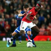 Aaron Morley in action against Manchester United's Paul Pogba in 2019