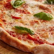 Foodhub revealed what the UK's favourite pizza toppings were (Canva)