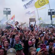 A variety of funny and colourful flags have been seen at this year's Glastonbury (PA)
