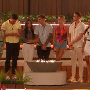 Islanders gathered around the firepit. Love Island continues tomorrow at 9pm on ITV2 and ITV Hub. Episodes are available the following morning on BritBox. Credit: ITV