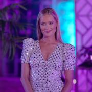 Laura Whitmore surprises the islanders.  Love Island continues tomorrow at 9 pm on ITV2 and ITV Hub. Episodes are available the following morning on BritBox. Credit: ITV