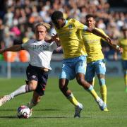 Bolton Wanderers' Kyle Dempsey under pressure from Sheffield Wednesday's Tyreeq Bakinson