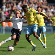 Bolton Wanderers' Kyle Dempsey under pressure from Sheffield Wednesday's Tyreeq Bakinson