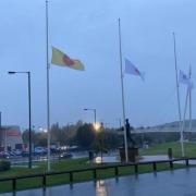 Flags at half mast at the University of Bolton Stadium