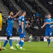 Dion Charles celebrates with Wanderers after his penalty against MK Dons