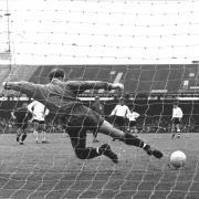 Francis Lee scores from the penalty spot for Wanderers against Derby