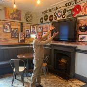 Owner Alan Ackers in the music area