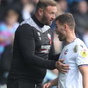 Ian Evatt speaks to Dion Charles during the 2-0 win against Lincoln City
