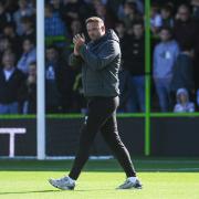 Ian Evatt claps the supporters after the full time whistle at Forest Green