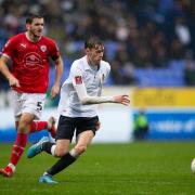 Conor Bradley in action for Wanderers against Barnsley in the FA Cup