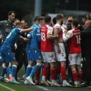 Tempers flare on the touchline as players and staff from Fleetwood and Bolton clash.