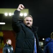 Bolton Wanderers manager Ian Evatt celebrates after the Barnsley victory