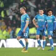 Bolton Wanderers players look dejected after the 2-1 defeat at Derby County.