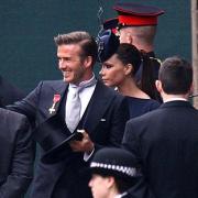 David and Victoria Beckham arrive for the royal wedding