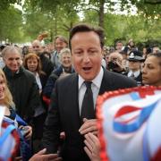 Prime Minister David Cameron meets well-wishers on The Mall