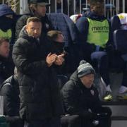Ian Evatt watches on from the sidelines as Wanderers are beaten 3-1 at Portsmouth