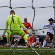 Bolton Wanderers' Shola Shoretire shot is saved by Morecambe's Connor Ripley